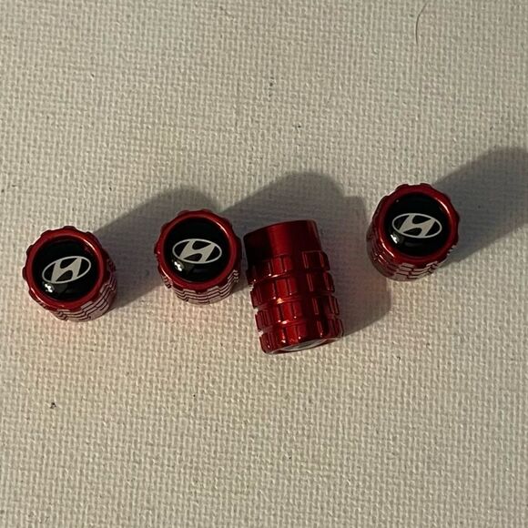 Hyundai valve Stem caps in Red set of 4 NWT - Picture 1 of 4
